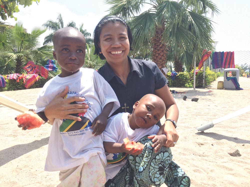 Natividad,-Genie-with-cildren-in-Tanzania-(1)